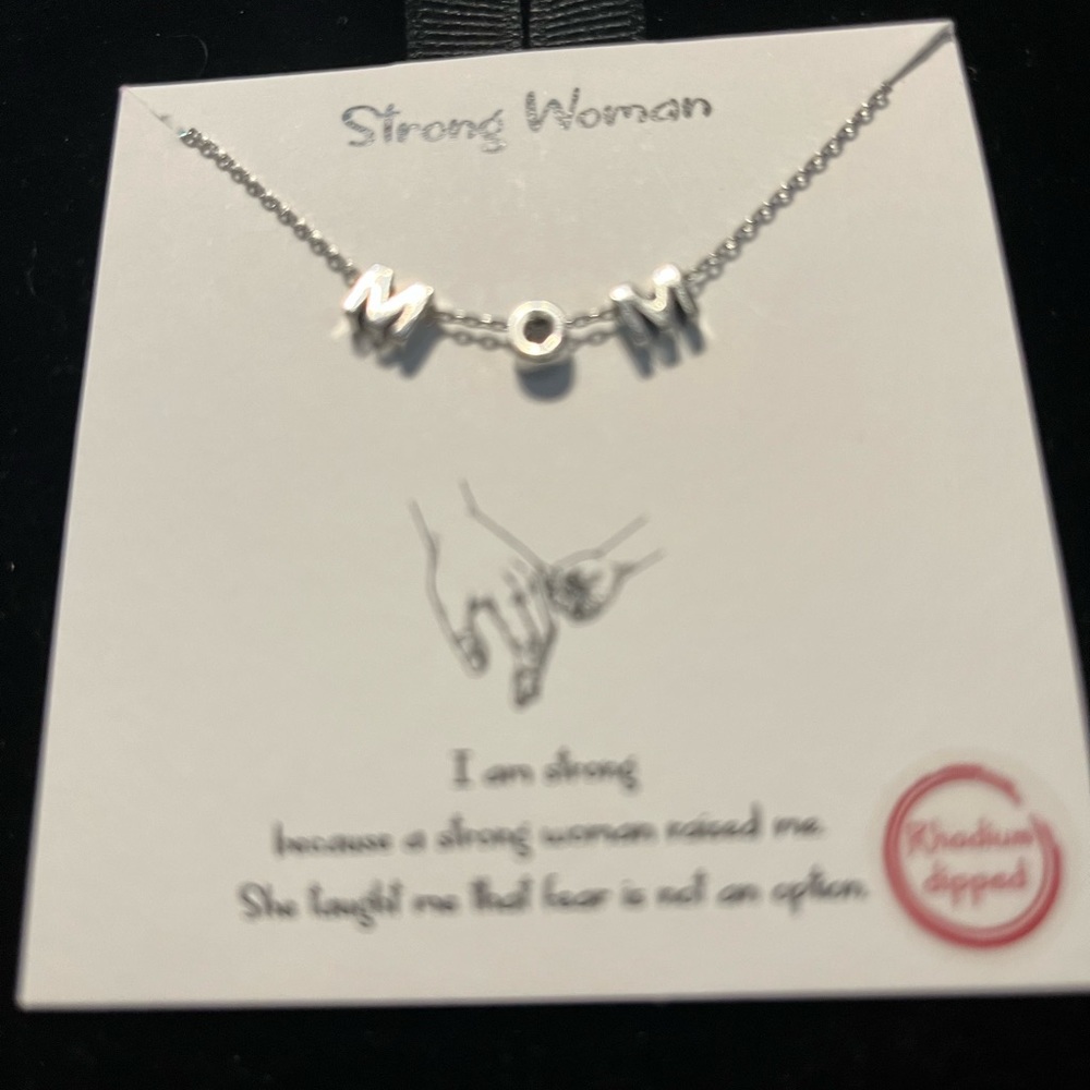 18" Silver Necklace with M O M letters.  The letters move on chain.

PRICE  DROP